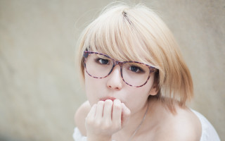 Woman glasses bangs blue eyes - glass free wallpaper