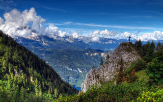 Mountain range valley clouds bernd 2 - a view of a valley and mountains free wallpaper