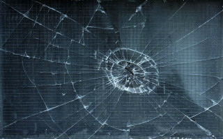 Broken glass window hole black - a hole in the middle of it free wallpaper