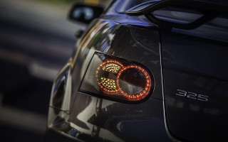Car red taillight parked street - car free wallpaper