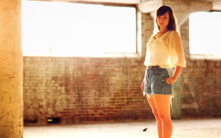 Woman skateboard brick wall sunset - a skateboard free wallpaper