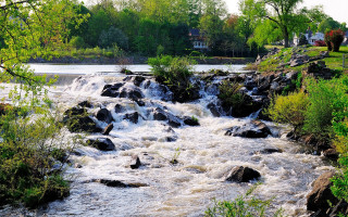 River rocks trees houses waterfall - alexander brook free wallpaper