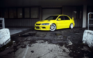 Yellow car parking lot building - a ladder free wallpaper
