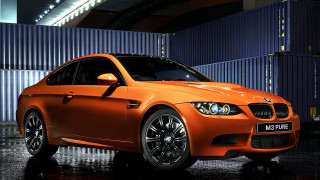 Bright orange car blue garage - a wall free wallpaper