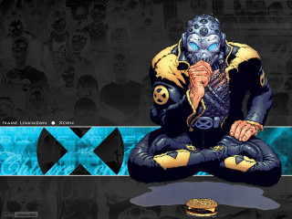 Man yellow black outfit sitting - text free wallpaper