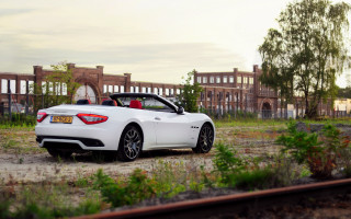 White sports car field building - a red top free wallpaper