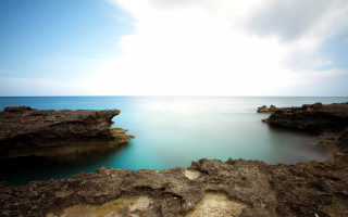 Lake rocks clouds horizon mountain - a body of water free wallpaper for desktop