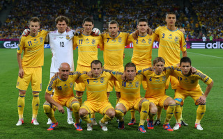 Group men soccer field astronaut - a group of men free wallpaper