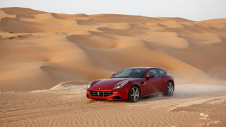 Red sports car desert dunes - the desert free wallpaper