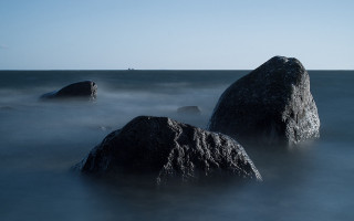 Rock water boat mountains scenery - the middle of a body free wallpaper