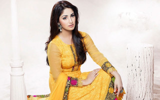 Woman yellow dress white chair 2 - a white chair free wallpaper