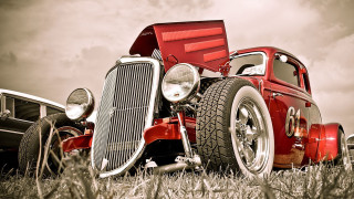 Red car tall grass truck - cloudy free wallpaper