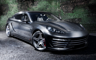 Black sports car green plants - a parking lot free wallpaper