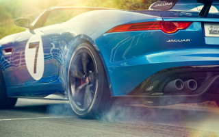 Blue sports car driving smoke - rear free wallpaper