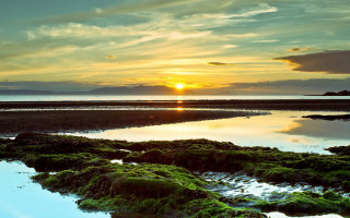 Sunset water island clouds landscape - a small island in the distance free wallpaper