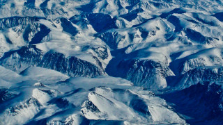 Mountain range snow ice water 2 - a view of a mountain range free wallpaper