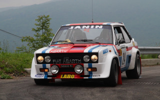 Rally car mountains road person - rim free wallpaper