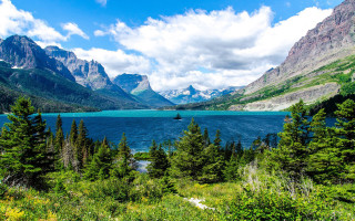Scenic lake mountains boat trees - a scenic view of a lake free wallpaper
