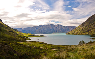 Mountain lake beach cloudy sky - cloudy free wallpaper