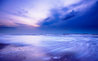 Beach wave sky clouds mountains - rich moody colour free wallpaper