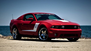Red mustang car beach ocean - the front of it free wallpaper