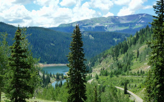 Mountain lake forest cloudy sky - tree and mountains free wallpaper