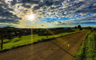 Road field fence sky clouds - a sky free wallpaper
