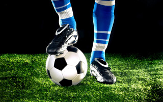 Soccer player blue white kicking - alain tasso free wallpaper