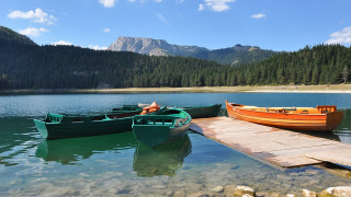 Lake mountains dock boat person - the dock free wallpaper
