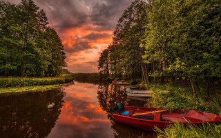 Red boat river forest cloudy - top of a river next free wallpaper