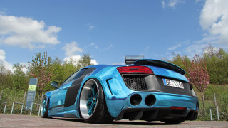 Blue sports car fence trees - a fence and trees free wallpaper