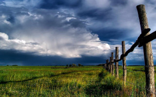 Wooden fence stormy sky city - cloud above free wallpaper