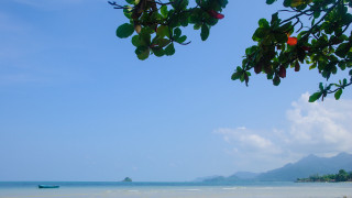 Boat beach mountains sky clouds - the water near a beach free wallpaper