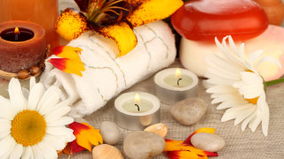 Towel candles flowers rocks autumn - a candle free wallpaper