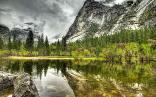 Mountain lake forest rocks cloudy - a mountain lake free wallpaper
