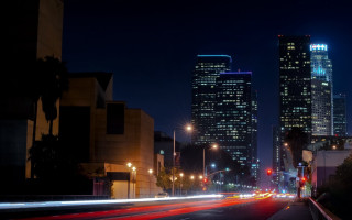 City street night lights skyscraper - the building and the street free wallpaper