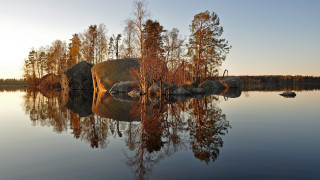 Lake rocks autumn forest sunset - a rock in the middle of it free wallpaper