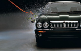 Car water spraying photorealism city - the front of the car free wallpaper