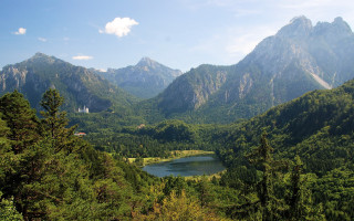 Lake mountains trees house panorama - avgust černigoj free wallpaper