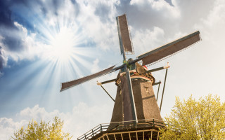 Windmill sunburst trees blue sky - barthel bruyn free wallpaper