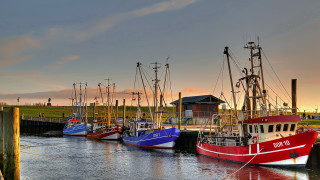 Boats harbor sunset vibrant colours - a group of boats free wallpaper