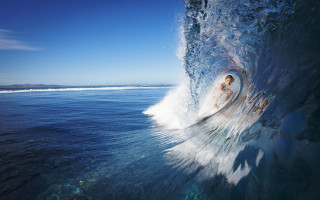 Surfing wave ocean blue sky - sense of depth free wallpaper