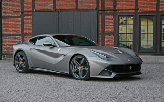 Silver sports car brick building - a brick building free wallpaper