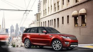 Red range rover cityscape tokyo - a red car free wallpaper