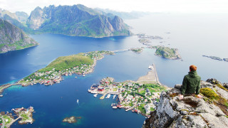 Cliff overlooking water town scenery - a cliff free wallpaper for desktop