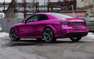 Pink car parking lot construction - a crane in the background free wallpaper