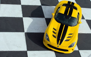 Yellow sports car checkered floor - floor free wallpaper