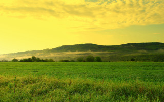 Mountain field yellow sky clouds - beautiful landscape free wallpaper for desktop