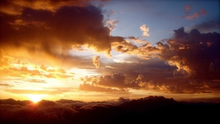 Sunset clouds plane mountain crepuscular - a mountain in the distance free wallpaper