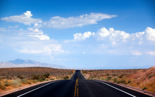 Long road mountain sky clouds - a long road free wallpaper